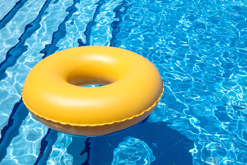 Yellow Inflatable Ring on Swimming Pool